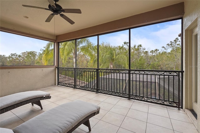 sunroom / solarium with ceiling fan