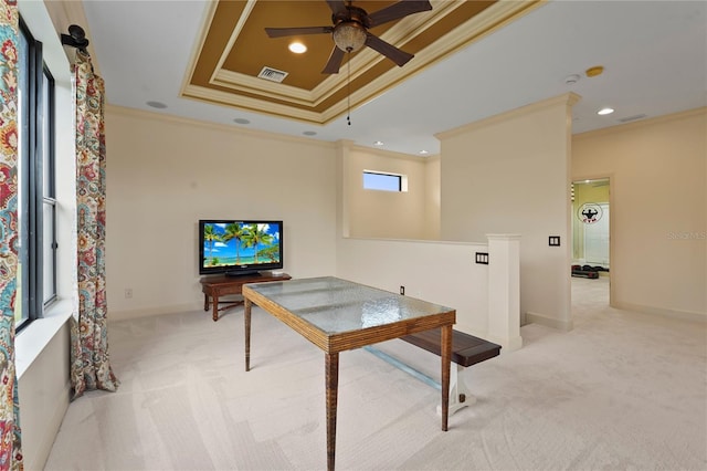 playroom featuring baseboards, visible vents, light colored carpet, a tray ceiling, and crown molding