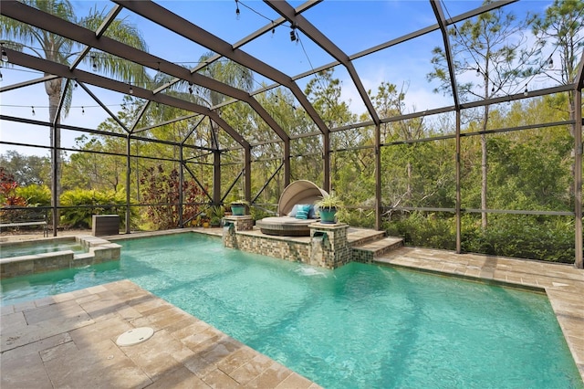 view of pool with glass enclosure, a patio, and a pool with connected hot tub