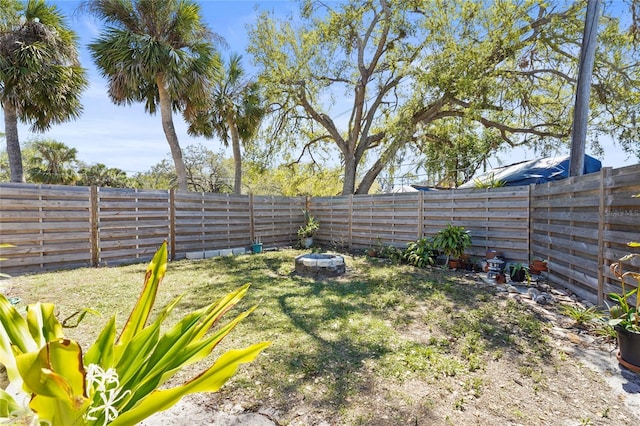 view of yard with a fenced backyard