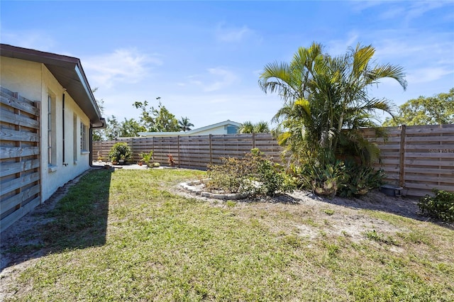 view of yard featuring a fenced backyard