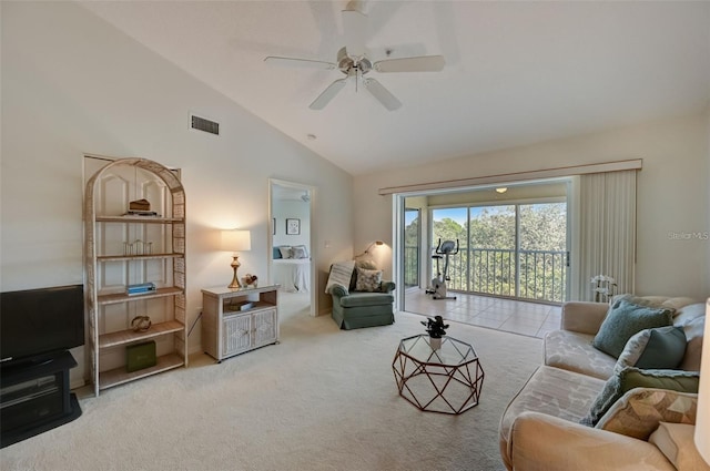 carpeted living room featuring ceiling fan, visible vents, and high vaulted ceiling