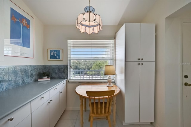 interior space with light tile patterned floors