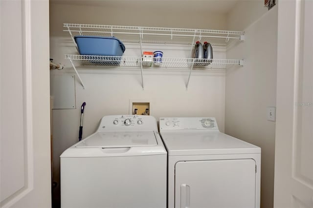 laundry area featuring laundry area and independent washer and dryer