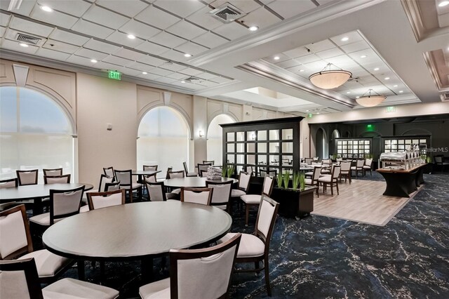 dining room featuring recessed lighting, visible vents, crown molding, and arched walkways