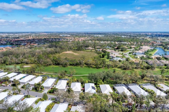 aerial view featuring a residential view and a water view