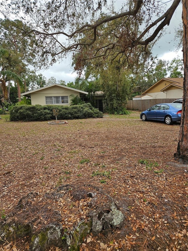 view of yard featuring fence