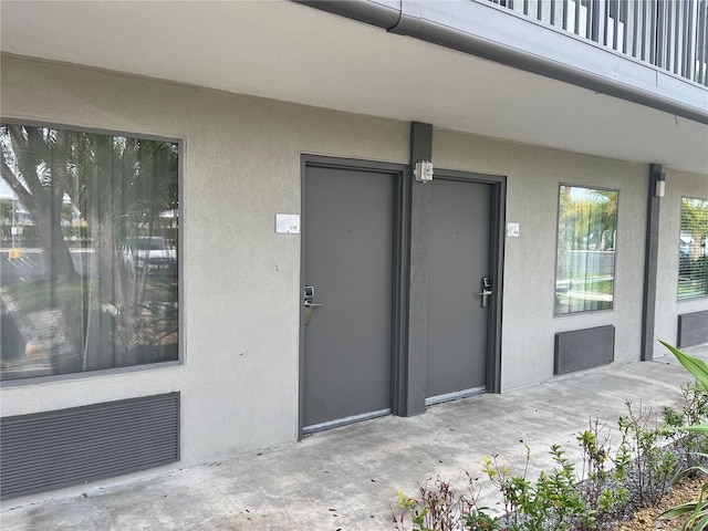 7150 N Tamiami Trl Unit S512, Sarasota, FL 34243 - entrance to property featuring stucco siding