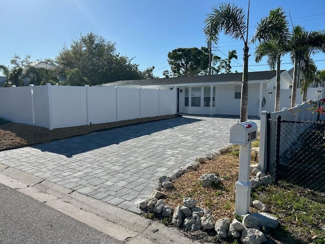 view of front facade with a fenced front yard