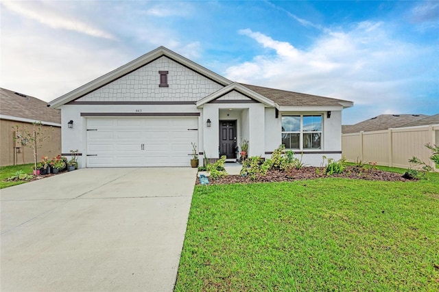 view of front facade with stucco siding, an attached garage, fence, driveway, and a front lawn