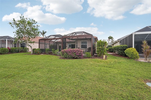 view of yard featuring a lanai