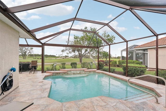 pool featuring view of golf course, a patio area, and glass enclosure