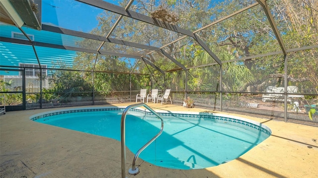 813 Plymouth St, Sarasota, FL 34242 - pool featuring glass enclosure and a patio area