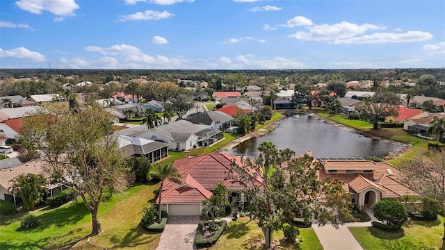 aerial view featuring a water view and a residential view