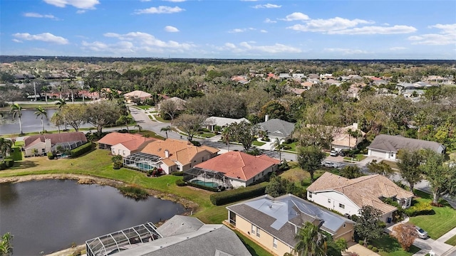 aerial view featuring a water view and a residential view