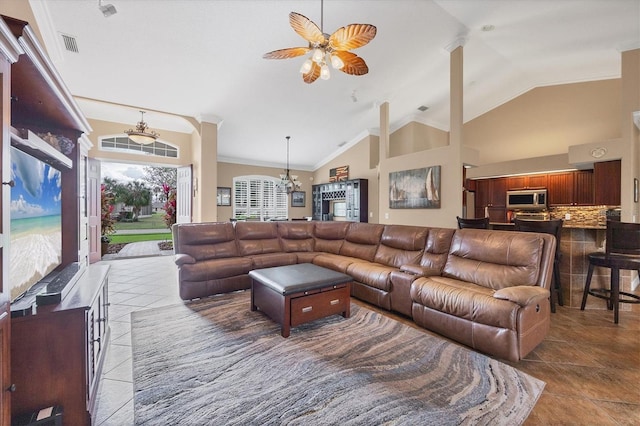 6211 90th Avenue Cir E, Parrish, FL 34219 - living room with ceiling fan, lofted ceiling, tile patterned flooring, a chandelier, and ornamental molding