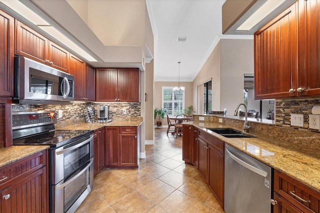 6211 90th Avenue Cir E, Parrish, FL 34219 - kitchen featuring stainless steel appliances, backsplash, crown molding, and light stone counters