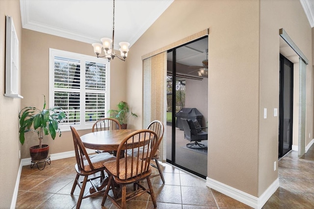 6211 90th Avenue Cir E, Parrish, FL 34219 - dining room with ornamental molding, a chandelier, and vaulted ceiling
