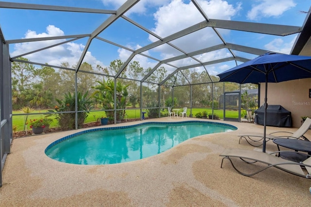 6211 90th Avenue Cir E, Parrish, FL 34219 - swimming pool with a grill and a patio area