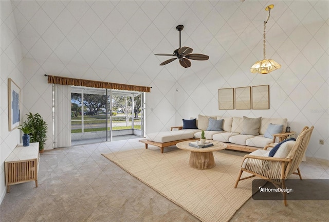 living area featuring a ceiling fan