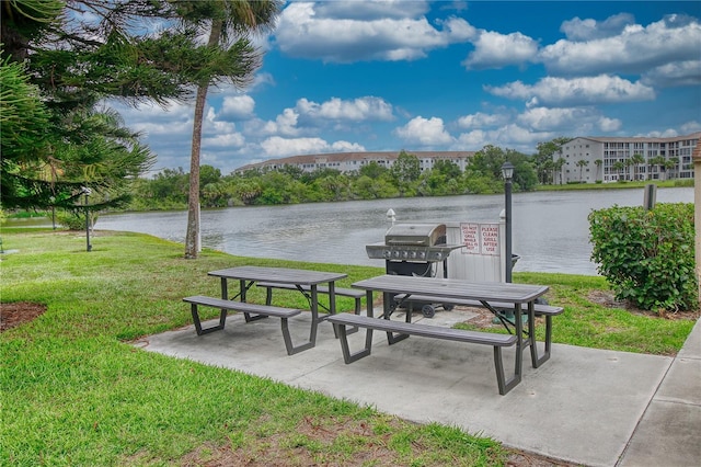 3658 Lake Bayshore Dr Unit 320, Bradenton, FL 34205 - view of property's community with a water view and a lawn
