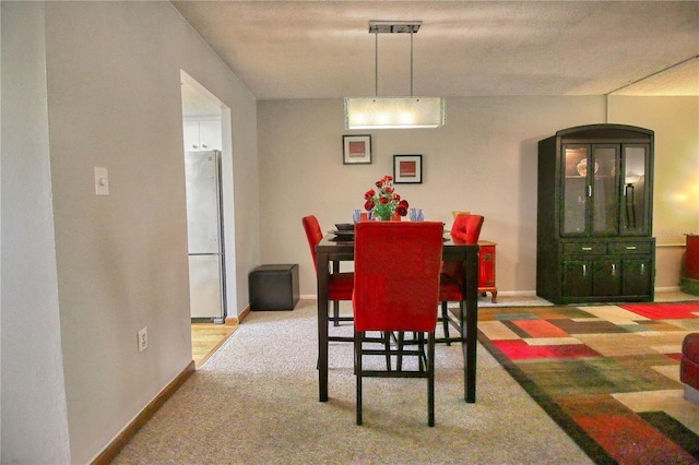 3658 Lake Bayshore Dr Unit 320, Bradenton, FL 34205 - carpeted dining room with baseboards