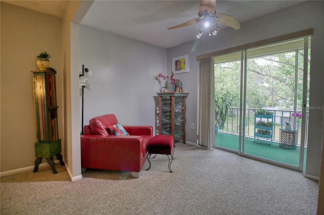 3658 Lake Bayshore Dr Unit 320, Bradenton, FL 34205 - sitting room featuring carpet, ceiling fan, and baseboards