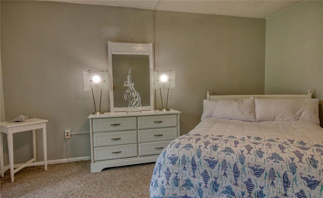 3658 Lake Bayshore Dr Unit 320, Bradenton, FL 34205 - bedroom featuring baseboards and light colored carpet