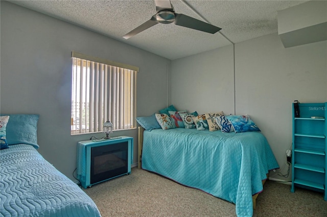 3658 Lake Bayshore Dr Unit 320, Bradenton, FL 34205 - carpeted bedroom featuring ceiling fan and a textured ceiling
