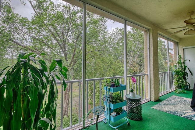 3658 Lake Bayshore Dr Unit 320, Bradenton, FL 34205 - unfurnished sunroom featuring ceiling fan