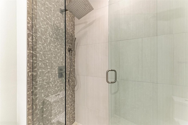 5591 Cannes Cir Unit 403, Sarasota, FL 34231 - full bathroom featuring tiled shower