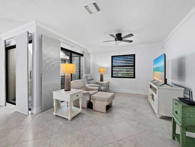 living room with plenty of natural light, visible vents, ceiling fan, and crown molding