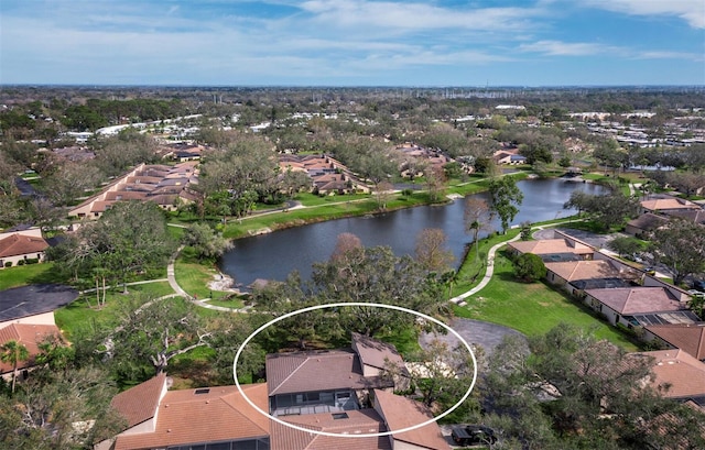 bird's eye view with a water view and a residential view