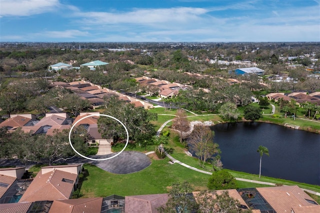 aerial view with a residential view and a water view