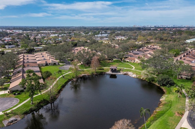 aerial view with a water view and a residential view