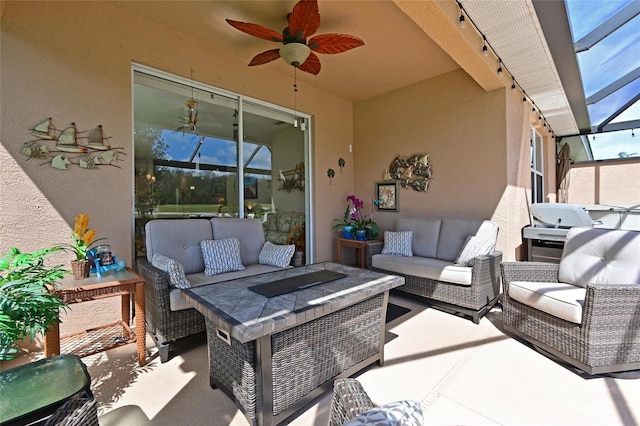 view of patio with a lanai, ceiling fan, and an outdoor hangout area