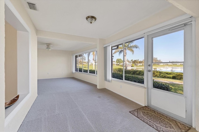 unfurnished sunroom with visible vents