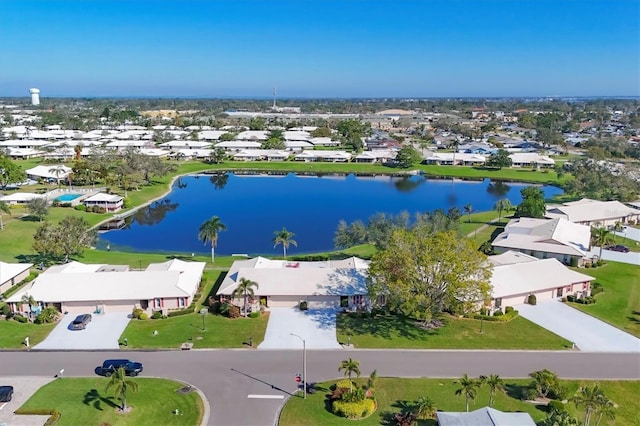 birds eye view of property featuring a residential view and a water view