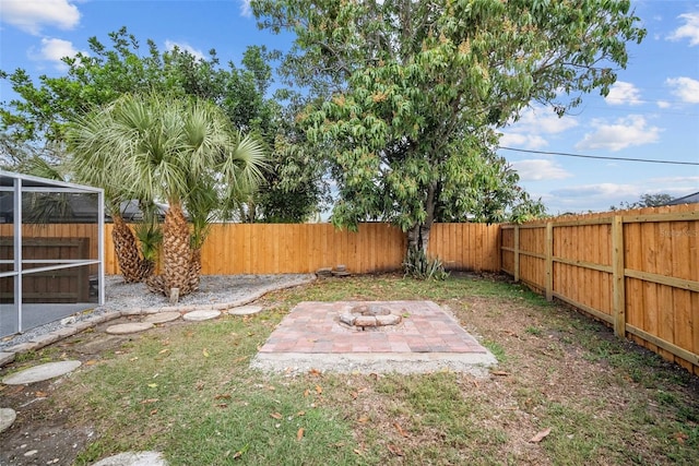 view of yard with a fenced backyard and a patio