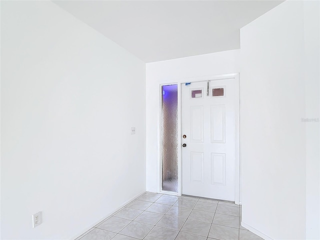 interior space featuring light tile patterned floors