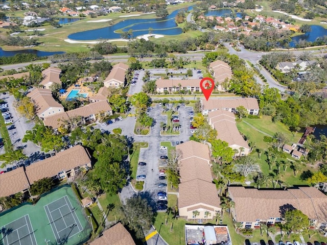 aerial view featuring a residential view and a water view