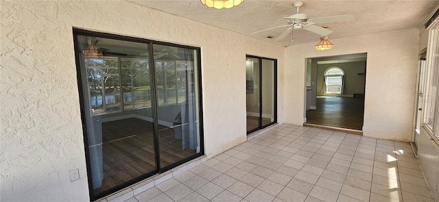 view of patio / terrace featuring a ceiling fan