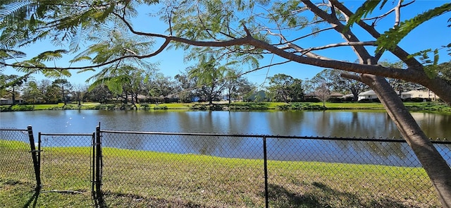 view of water feature with fence