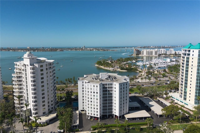 aerial view featuring a water view and a city view