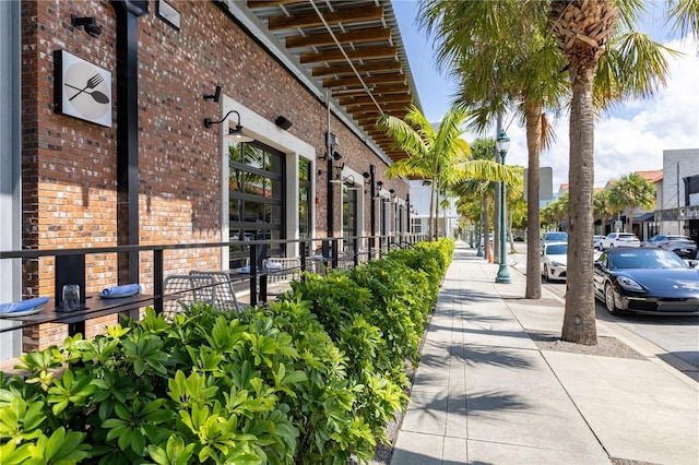 exterior space with brick siding