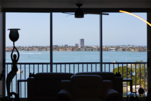 interior space featuring a view of city and a water view