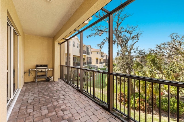 balcony featuring a grill and a residential view