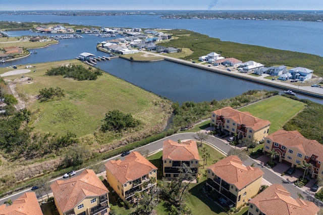 bird's eye view featuring a residential view and a water view