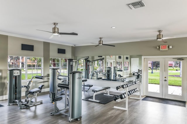 workout area with french doors, crown molding, visible vents, wood finished floors, and baseboards