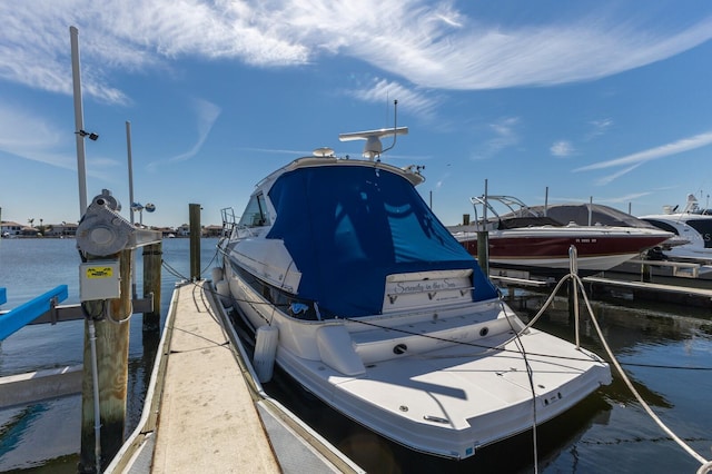 view of dock with a water view and boat lift